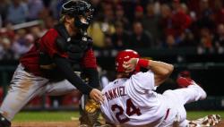 Ankiel tagged out at home (Bill Greenblatt, UPI)