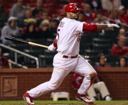 Pujols watches one of his four hits (Bill Greenblatt, UPI)