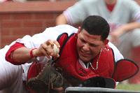 Molina shows the ump he's still got the ball (Bill Greenblatt, UPI)