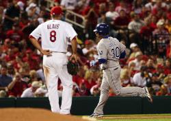 Mike Aviles rounds third after his HR (Bill Greenblatt, UPI)