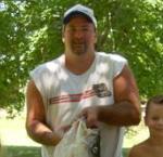 Blair with his record 56 pound bass