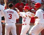 Miles is congratulated by teammates (Bill Greenblatt, UPI)