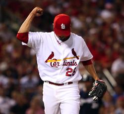 Kyle Lohse pumps his fist after getting out of the 7th, up 3-1 (Bill Greenblatt, UPI)