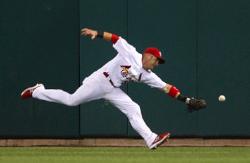 Skip Schumaker can't pull in a double, Bill Greenblatt, UPI