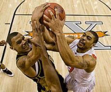 Keith Ramsey battles for a rebound (courtesy ostatephoto.com)