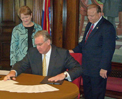 Governor Jay Nixon with Senators Joan Bray and Gary Nodler