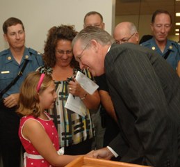 Gov. Nixon shakes Hope Turner's hand