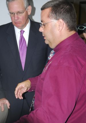 Investigator Mark Sullivan shows Gov. Nixon the computer fornsics lab in Boone County, and where the examination of computers, cell phones and external memory devices take place.