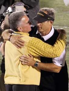 Missouri Tigers head football coach Gary Pinkel (R) is hugged by athletic director Mike Alden after defeating the top ranked Oklahoma Sooners 36-27 at Faurot Field in Columbia, Missouri on October 23, 2010.   UPI/Bill Greenblatt