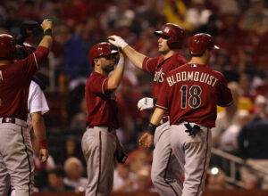 Arizona Diamonbacks Paul Goldschmidt is greeted at home plate by teammates after hitting a grand slam home in the seventh inning against the St. Louis Cardinals at Busch Stadium in St. Louis on June 5, 2013.  UPI/Bill Greenblatt