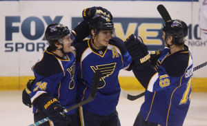 St. Louis Blues Alexander Steen (C) is congratulated by teammates T.J. Oshie (L) and Jay Bouwmeester after scoring the first of his two goals in period one against the Montreal Canadiens  at the Scottrade Center in St. Louis on December 19, 2013. UPI/Bill Greenblatt