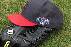 A St. Louis Cardinals glove and hat, with the new postseason logo, sit on the Busch Stadium field during a workout at Busch Stadium in St. Louis on October 1, 2013. The St. Louis Cardinals will face the winner of the Cincinnati Reds-Pittsburgh Pirates game on October 4, 2013 for game one.   UPI/Bill Greenblatt