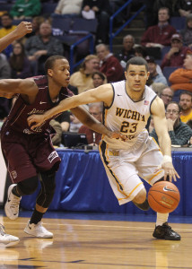Wichita State Shockers Fred Van Vleet gets by Missouri State Bears Devon Thomas in the second half during the Missouri Valley Conference Tournament at the Scottrade Center in St. Louis on March 8, 2014. Wichita State defeated Missouri State 67-42. UPI/Bill Greenblatt