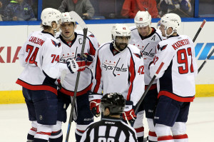 Washington Capitals Alex Ocechkin (8) of Russia celebrates his 50th goal of the season with his teammates in the first period of their game against the St.Louis Blues at the Scottrade Center in St. Louis on April 8, 2014.   UPI/Rob Cornforth