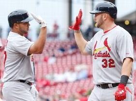 Matt Adams congratulates Jhonny Peralta after his two-run homer in the second (MLB photos)