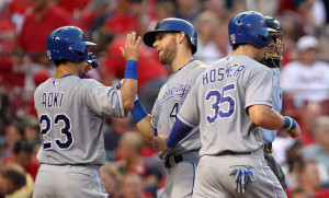 Kansas City Royals Alex Gordon (4) is greeted at home plate by teammates Nori Aoki (23) and Eric Hosmer (35)after hitting a three run home run  in the fifth inning against the St. Louis Cardinals at Busch Stadium in St. Louis on June 3, 2014.     UPI/Bill Greenblatt