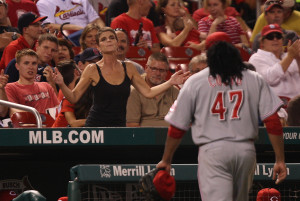 A woman taunts Cincinnati Reds starting pitcher Johnny Cueto as he comes out of the game against the St. Louis Cardinals in the sixth inning at Busch Stadium in St. Louis on August 20, 2014.      UPI/Bill Greenblatt