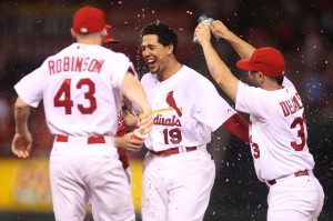 St. Louis Cardinals Jon Jay is soaked with water by teammates after being hit by a Cincinnati Reds J.J. Hoover pitch with bases loaded in the ninth inning at Busch Stadium in St. Louis on August 19, 2014. St. Louis won the game 5-4.      UPI/Bill Greenblatt