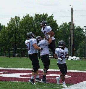 The offense celebrates a touchdown in Saturday's scrimmage. (photo/Missouri State athletics)