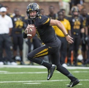 Maty Mauk scrambles to find a receiver in Saturday's opener against South Dakota State (photo/Mizzou)