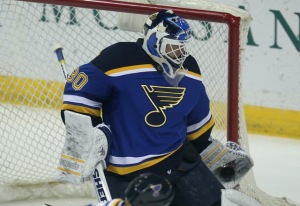 St. Louis Blues goaltender Martin Brodeur makes a glove save against the Colorado Avalanche in the first period at the Scottrade Center in St. Louis on December 29, 2014. UPI/Bill Greenblatt