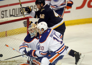 St. Louis Blues David Backes (42) puts the puck past Edmonton Oilers goaltender Ben Scrivens for a goal in the first period at the Scottrade Center in St. Louis on January 13, 2015.    Photo by Bill Greenblatt/UPI