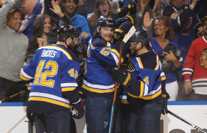 St. Louis Blues Colton Parayko (55) is mobbed by teammates after scoring a goal in the first period against the Chicago Blackhawks at the Scottrade Center in St. Louis on April 25, 2016. Photo by Bill Greenblatt/UPI