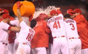 St. Louis Cardinals Kolten Wong pours water on all after Yadier Molina hit the game winning RBI against the Cincinnati Reds in the ninth inning at Busch Stadium in St. Louis on September 29, 2016. St. Louis won the game 4-3. Photo by Bill Greenblatt/UPI