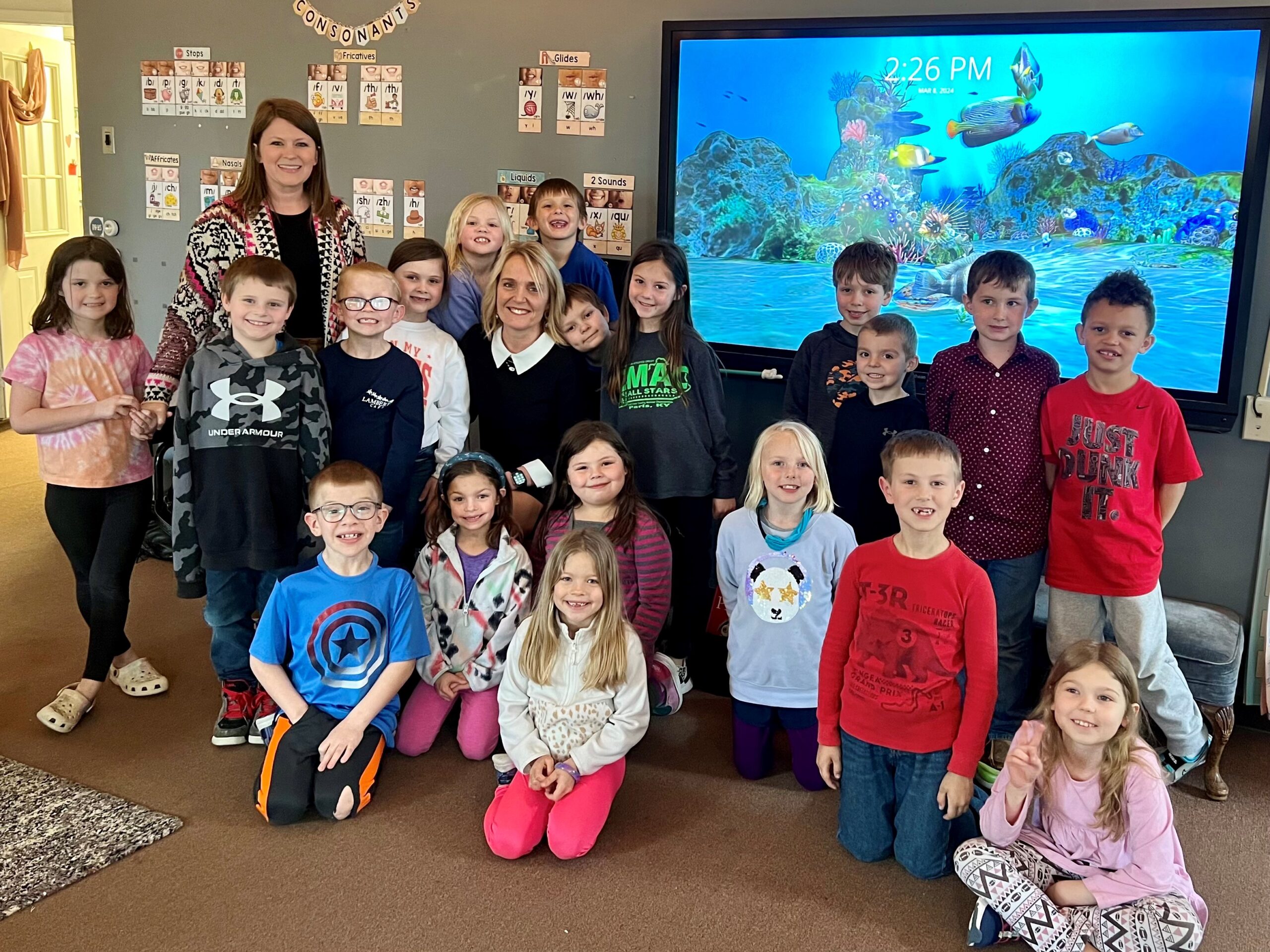 Commissioner Margie Vandeven pictured with Paris R-II Elementary School kindergarten and first grade students to celebrate Missouri School Read-In Day