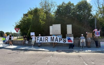 Protesters hanging banners along I-70 opposing Missouri’s special legislative session
