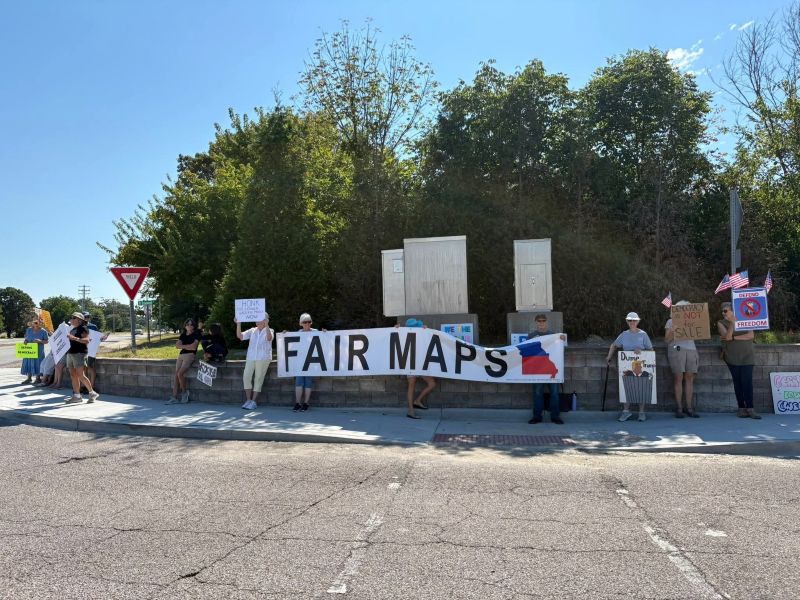 Protesters hanging banners along I-70 opposing Missouri’s special legislative session